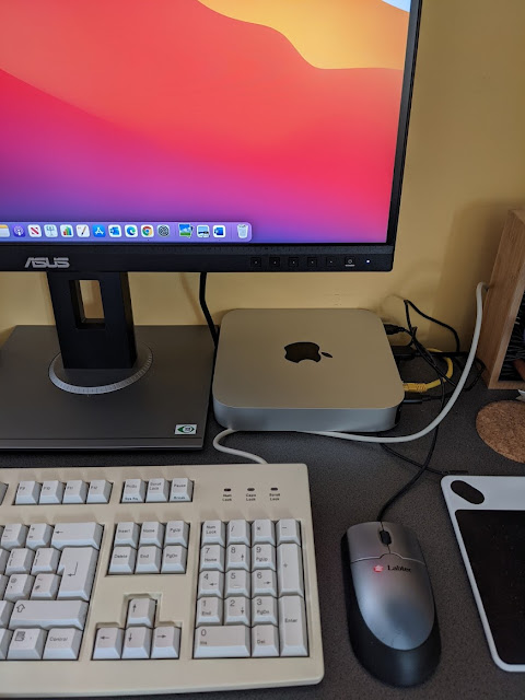 M1 Mac Mini with 90s PC keyboard and mouse